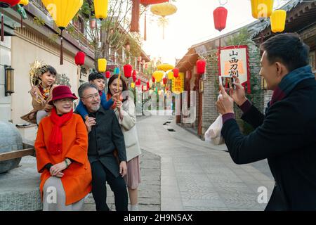 Temple fairs to pose for photos of family of six Stock Photo