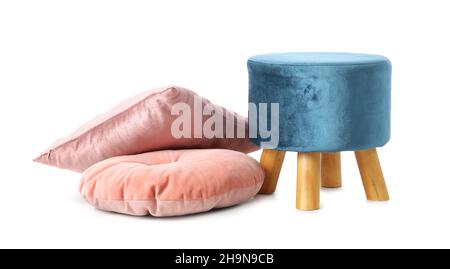 Blue pouf with pink pillows on white background Stock Photo