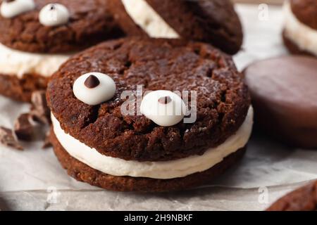Funny cookie for Halloween on table, closeup Stock Photo