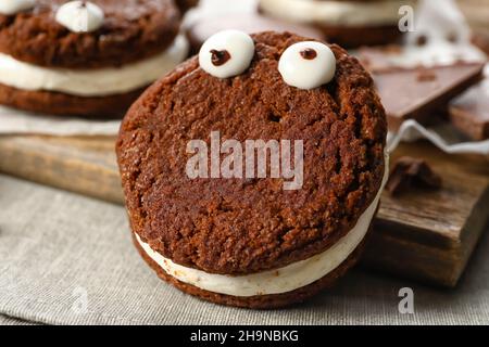 Funny cookie for Halloween on table, closeup Stock Photo