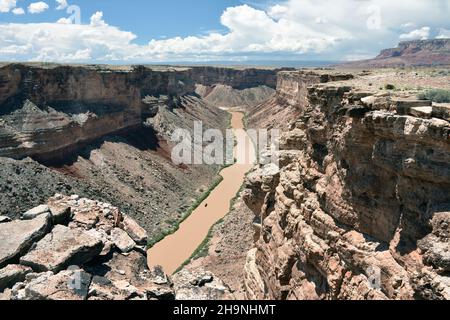 Colorado River flows through Marble Canyon on the way towards Grand Canyon in northern Arizona. Muddy water caused by recent monsoon rains. Stock Photo