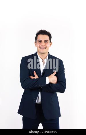 Portrait of young latin successful businessman on white background in Latin America Stock Photo