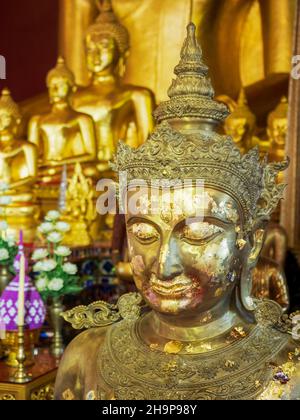 Buddha covered with gold leaf, Wat Phra Singh, Chiang Mai, Thailand Stock Photo