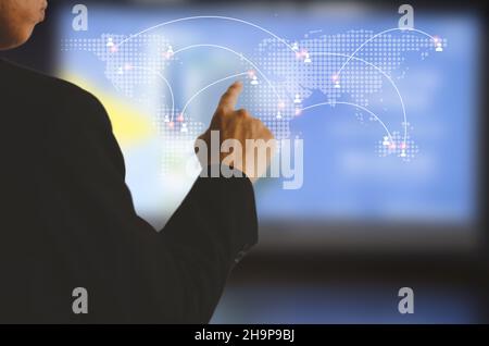 businessman touching on world map screen communication technology global network internet connection, virtual screen Stock Photo