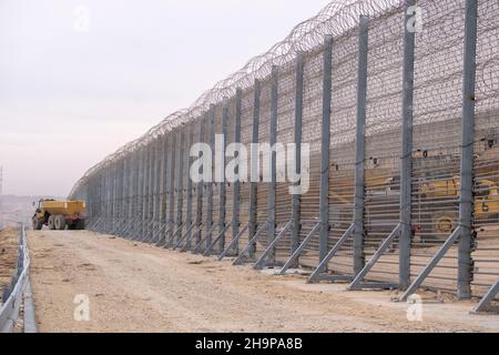 Gaza Border, Israel. 7th Dec, 2021. The new subterranean concrete border wall at the northern border with the Gaza Strip on December 07, 2021 near Netiv HaAsara, Israel. The new border wall is the largest project ever carried out in Israel’s military history. It includes both physical barriers and technological detection systems to better protect against infiltration from the Gaza Strip and runs above and below ground along the border. Credit: Eddie Gerald/Alamy Live News Stock Photo