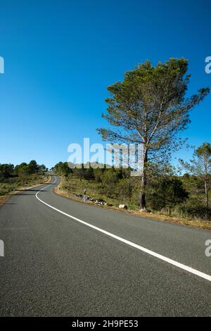 Winding mountain road between Pego village and Vall d'Ebo, Marina Alta, Costa Blanca, Alicante Province, Spain Stock Photo