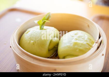 Chinese Steamed Buns or Mantou Green tea favor food Stock Photo