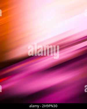 Abstract gradient orange and pink motion blur lines colorful silk pattern textured background Stock Photo