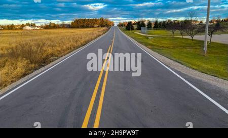 Rural Wisconsin road that goes off into distance Stock Photo
