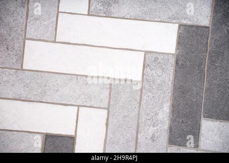 Rectangular floor tiles in white and gray tones Stock Photo
