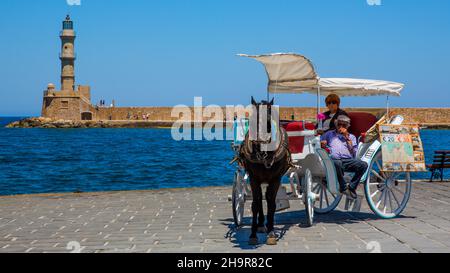 Panorama harbour town of Chania with tourist carriages, Crete, Chania, Crete, Greece Stock Photo