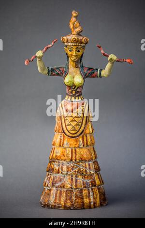Goddess of the Serpents (replica), from the Palace of Knossos, 1500 BC (faience), Archaeological Museum with most important finds of the Minoan Stock Photo
