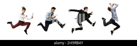 Busy and hurried employees dancing in casual clothes or suit on white. Ballet dancers. Business, start-up, working open-space concept. Stock Photo