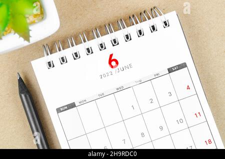 June 2022 Calendar Desk For Organizer To Plan And Reminder On Wooden Table On Nature Background Stock Photo - Alamy