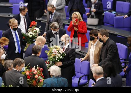 12/08/2021, Berlin, Germany, Olaf Scholz receives flowers after the election as Federal Chancellor. Olaf Scholz (SPD) elected Chancellor in the Bundestag. The secret election of the Federal Chancellor is elected by the Bundestag without debate. Stock Photo