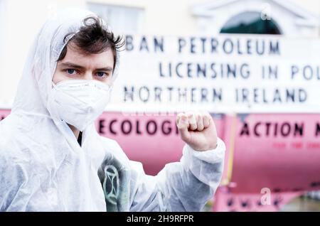Extinction Rebellion activist Oscar Mooney, from Sandymount, as the group held a demonstration outside Sinn Fein’s headquarters in Dublin calling on the party to act now in the Northern Irish Executive to ensure a full and final ban on petroleum licensing. Picture date: Wednesday December 8, 2021. Stock Photo