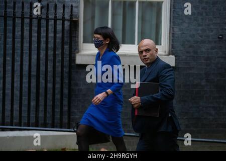 LONDON, UK 8TH DECEMBER 2021. Sajid Javid the Secretary of State for Health and Social Care and Jenny Harries the Deputy Chief Medical Officer arrives at 10 Downing Street ahead of Covid-19 briefing Credit: Lucy North/Alamy Live News Stock Photo