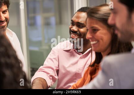 Multicultural business start-up team in a meeting or workshop Stock Photo