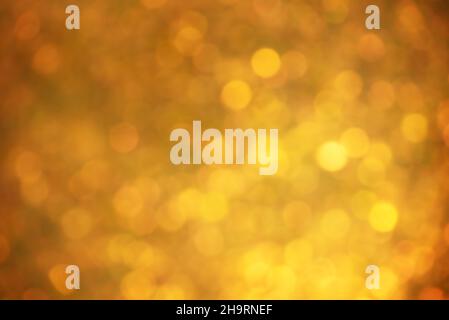 Defocus light yellow glitter. Color is gold abstract background. Stock Photo