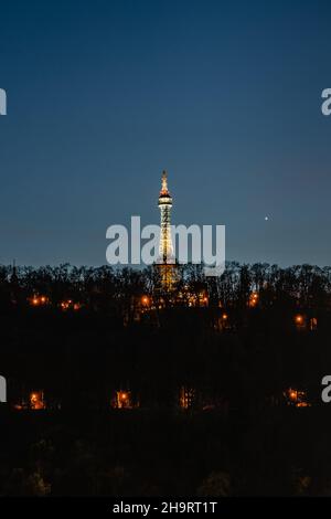 Illuminated Petrin Lookout Tower,Prague,Czech republic.Steel tower 63.5 metres tall on Petrin Hill built in 1891.Observation transmission tower Stock Photo