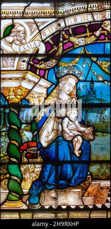 Renaissance Flemish style stained glass window detail of Blessed Virgin Mary and baby Jesus by J.  Fisher c 1903, Barsham church, Suffolk, England, UK Stock Photo