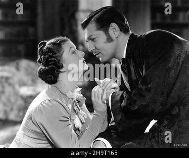 MYRNA LOY as Katie O'Shea and CLARK GABLE as Irish Politician Charles Stewart Parnell in PARNELL 1937 director / producer JOHN M. STAHL play Elsie T. Schauffler screenplay John Van Druten and S.N. Behrman gowns Gilbert Adrian Metro Goldwyn Mayer Stock Photo