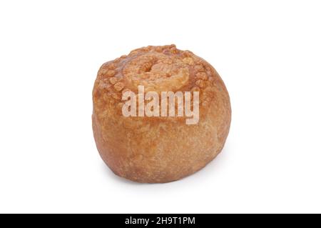 Studio shot of a single small pork pie cut out against a white background - John Gollop Stock Photo