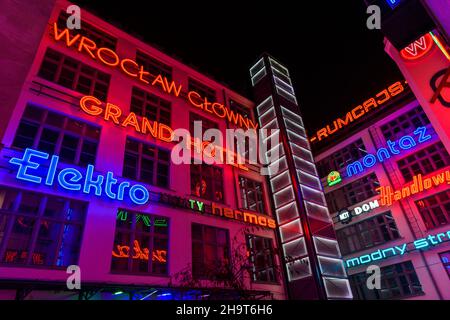 Evening shots at Galeria Neon Side in Wrocław in Poland. A feast for the eyes of old neon signs from around Poland, all in one sheltered courtyard. Stock Photo