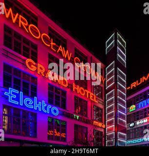 Evening shots at Galeria Neon Side in Wrocław in Poland. A feast for the eyes of old neon signs from around Poland, all in one sheltered courtyard. Stock Photo