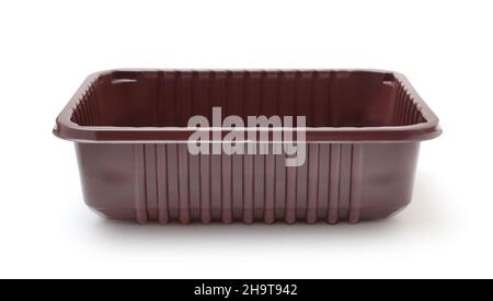Empty brown plastic food tray isolated on white. Stock Photo