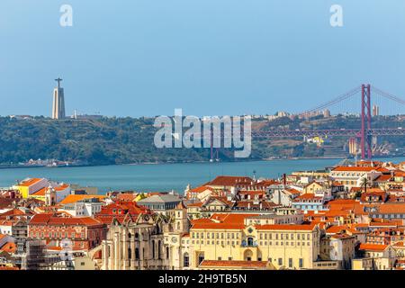 View to downtown of Lisbon with banks of tagus river and bridge of 25 of April in a background, Portugal Stock Photo
