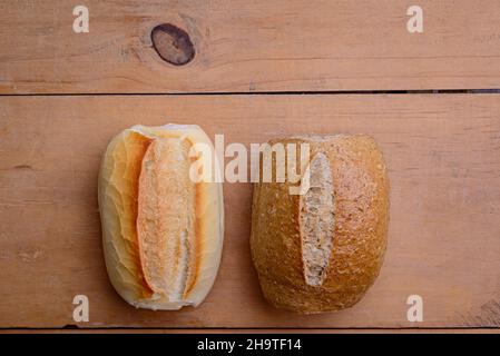 French rolls. Brazilian breads on wooden table. Stock Photo