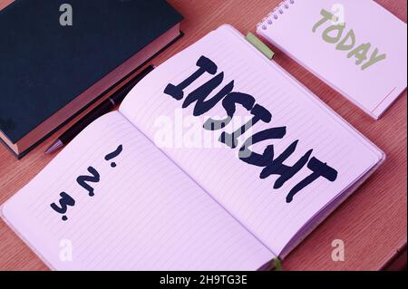 Text sign showing Insight. Business approach Capacity Gain accurate deep understanding of someone or something Plain Blank Open Notebooks With Stack Stock Photo