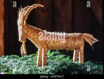 Traditional Swedish Chrismas Billy goat on spruce twigs Stock Photo