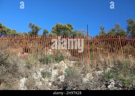 The Unclimbable Fence at Upper Rock on the the Rock of Gibraltar Stock Photo