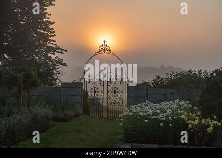 Beautiful view of the gates against the sunset. Harkness Memorial State Park, Connecticut. Stock Photo