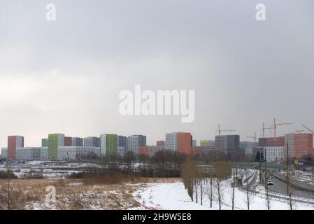 Construction of a huge new district in Moscow. The same type of multi-colored houses-cubes. Winter in New Moscow. Stock Photo