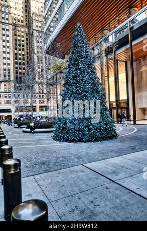 Christmas Tree on display in the new pedestrian plaza which separates Grand Central Terminal and supertall One Vanderbilt in New York City, USA  2021 Stock Photo