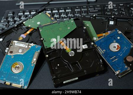 Pile of Hdd storage devices computer components.hi tech parts shortage Stock Photo