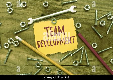 Text caption presenting Team Development. Concept meaning learn why and how small groups change over time with graphs New Ideas Brainstoming For Stock Photo