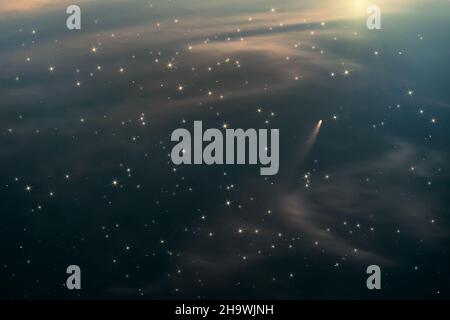 Abstract space background with stars, nebulae and comet flying towards a star in deep space Stock Photo