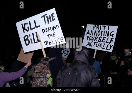 London, UK, 8th Dec, 2021, 'Kill the Bill' protesters hold up placards in Westminster as the third reading of the Police, Crime, Sentencing and Courts Bill (PCSC) got underway in the House of Lords. The new legislation, if passed, will grant police additional powers to crack-down on protest by allowing stop-and-search, data sharing of activists details and the breaking-up of demonstrations deemed as causing 'serious annoyance'. Campaigners say the bill will also criminalise the Gypsy, Roma and Traveller communities way of life. Credit: Eleventh Hour Photography/Alamy Live News