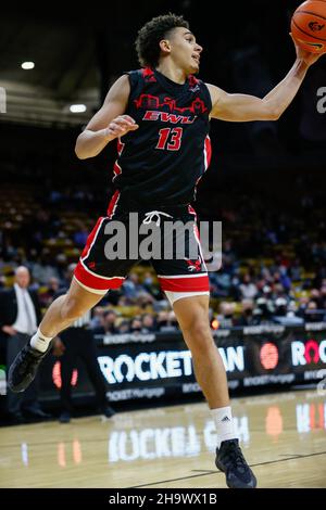 Boulder, CO, USA. 08th Dec, 2021. Eastern Washington Eagles forward Angelo Allegri (13) grabs a defensive rebound in the men's basketball game between Colorado and Eastern Washington at the Coors Events center in Boulder, CO. CU escaped 60-57. Derek Regensburger/CSM/Alamy Live News Stock Photo