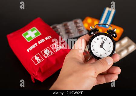 Top view of a first aid medical kit on black background Stock Photo