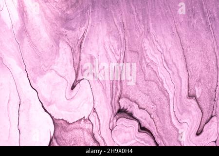 Abstract fluid art background purple and lilac colors. Liquid marble. Acrylic painting on canvas with pink gradient. Watercolor backdrop with wavy pat Stock Photo