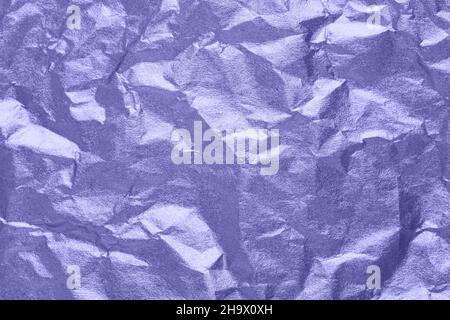 Paper texture in Very peri color of the Year 2020. Violet wrinkled background. Stock Photo