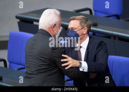 Berlin, Deutschland. 08th Dec, 2021. Wolfgang KUBICKI, Vice President of the Bundestag, congratulates Christian LINDNER (FDP), Federal Minister of Finance, Federal Minister of Finance, 5th plenary session of the German Bundestag with the election and swearing-in of the Federal Chancellor and the Federal Ministers, German Bundestag in Berlin, Germany on December 8th, 2021 Credit: dpa/Alamy Live News Stock Photo