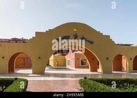Hurghada, Egypt - May 31, 2021: Entrance to traditional market (Souk) in Hurghada on the waterfront on the Red Sea. Lettering in English and Arabic. Stock Photo