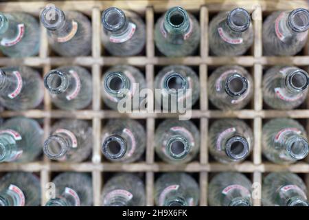 Izmir, Turkey - June 21, 2021: The old glass empty soda bottles. Stock Photo