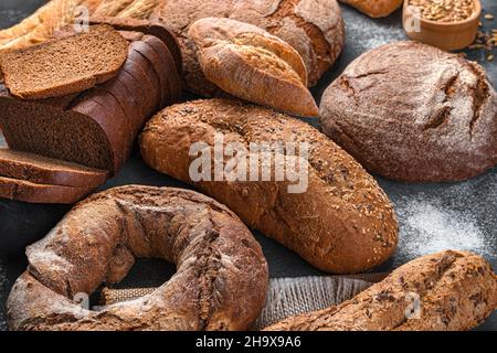 Bread of different types in close-up. Bakery products. Side view. Stock Photo